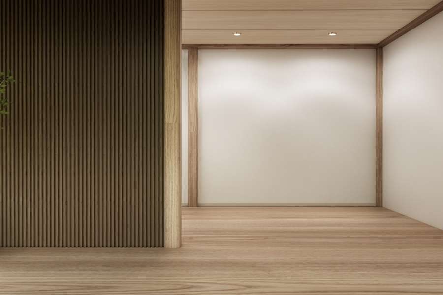 Modern minimalist room interior with striking dark vertical wood panels on the left wall.